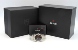 A boxed Tudor 1926 black dial model gents wristwatch, runs, case diameter 37mm
