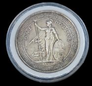 A 1912 British trade dollar with Chinese characters and Jawi script within floral pattern to reverse