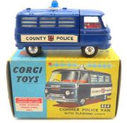 A boxed Corgi diecast model No. 464 Commer Police