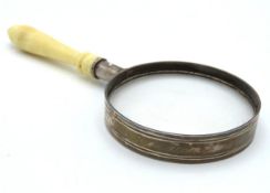 A Edmund Kaszewski 2003 silver mounted magnifying glass with a turned ivory coloured plastic handle