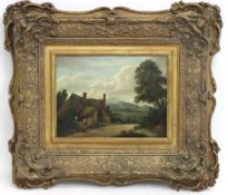 An 18thC. landscape oil on panel in the style of G