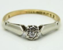 An antique art deco style solitaire ring with plat