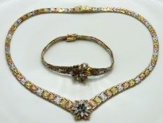 A three colour gold plated silver necklace & brace