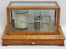 An oak cased barograph, 368mm wide x 236mm deep x