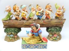 A Walt Disney Showcase Collection seven dwarf figu