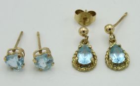 A pair of 9ct gold pear shaped earrings set with t