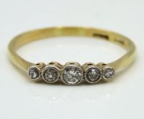 An antique 18ct gold ring set with five diamonds o