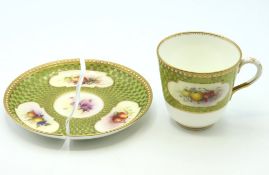 A Royal Worcester cup & saucer decorated & signed by Richard Sebright, gilded by Charlie Creese, cup