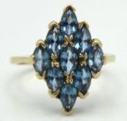 A 9ct gold ring set with topaz, head 19mm x 14mm,
