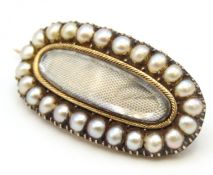 A George III yellow metal memorial brooch bearing