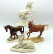 Two porcelain unicorn figures by David Cornell twinned with a katzhutte horse & foal group, 230mm wi