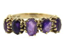 A 9ct gold five stone amethyst ring, 2.7g, size N