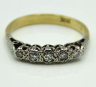 An antique 18ct gold ring set with five diamonds o