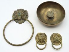 A brass lion head towel ring 190mm drop, a pair of