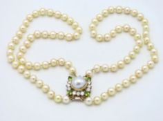 A double strand cultured pearl necklace choker wit