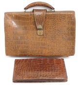 A crocodile skin clutch bag, 258mm x 158mm twinned