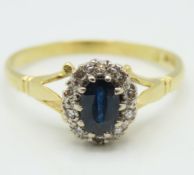 An 18ct gold ring set with ten small diamonds & sa