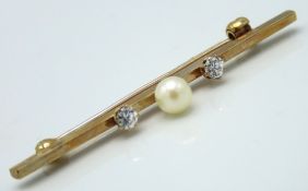 A 9ct gold bar brooch set with pearl & paste stone