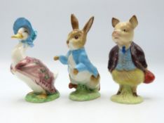 Three Beswick Beatrix Potter figurines: Pigling Bl