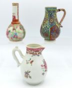 An 18thC. Chinese famille rose jug twinned with a