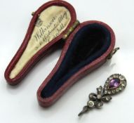 An Edwardian silver amethyst pendant with original