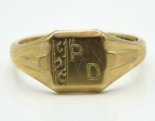 A 9ct gold signet ring monogrammed 