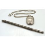 A silver locket & chain, locket 42mm x 30mm, chain