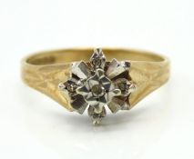 A 9ct gold ring set with five small diamonds, 2.5g