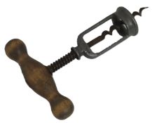 An antique spring assisted corkscrew, 150mm long