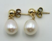 A pair of 14ct gold mounted pearl earrings, 16mm d