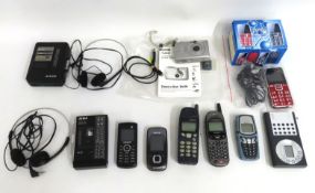 A selection of old mobile phones including three N