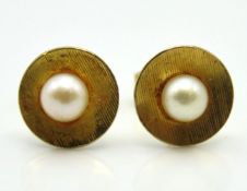 A pair of 9ct gold earrings set with cultured pear