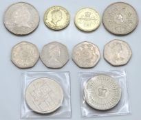 Four £5 UK crowns twinned with four 50p pieces & t