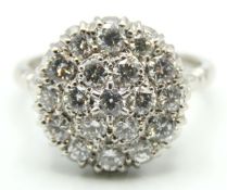 An 18ct white gold diamond cluster ring, approx. 1.49ct, 6.2g, size N