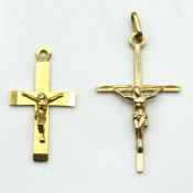 Two 9ct gold crucifix cross pendants, largest 31mm