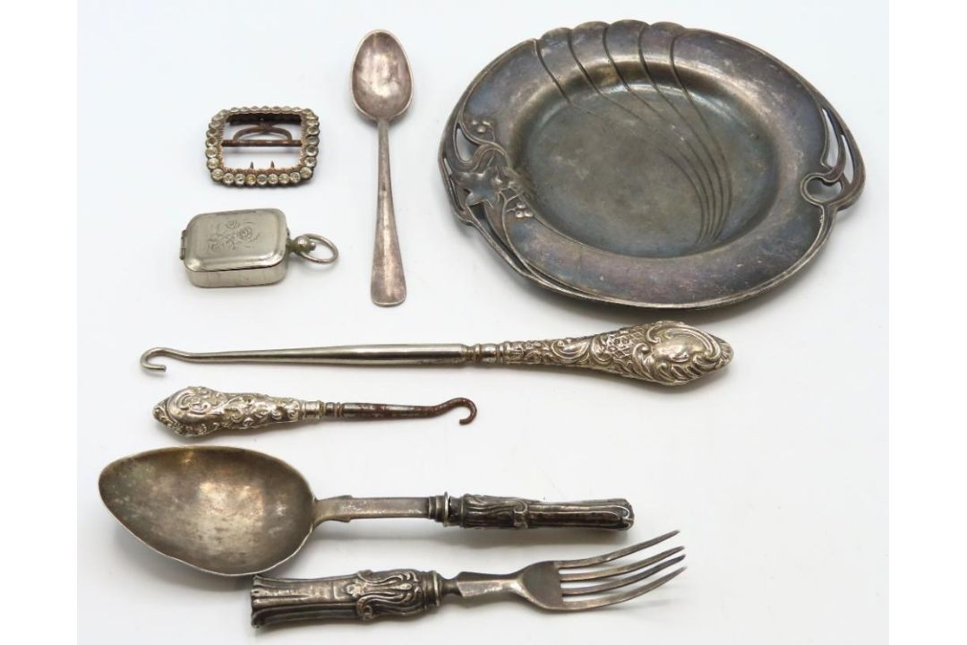 A WMF art nouveau dish twinned with two silver han