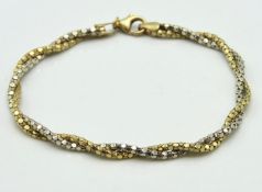 A 9ct gold double strand twist bracelet, 190mm lon