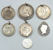 A selection of mounted silver coinage, 54.3g