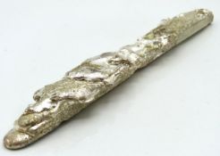 A white metal ingot, 167.5g