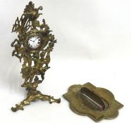 A 19thC. brass pocket watch stand with top wind wa