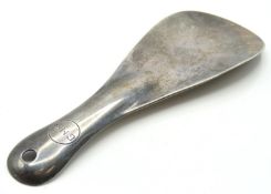 An American sterling silver shoehorn, monogrammed