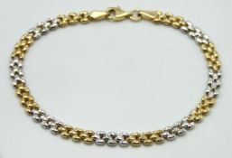 A 9ct two colour gold bracelet, 180mm long, 3.2g
