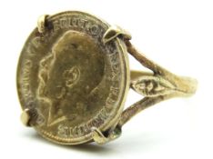 A gold plated silver coin ring set with a George V