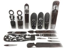 Three carved African masks, eight Afro combs & oth