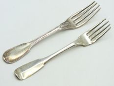 Two 19thC. dinner forks, one French silver, the ot