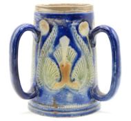 A 19thC. stoneware tyg with inscribed decor & Lond