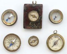Six miniature antique compasses, all work except o