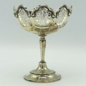 A 1912 Birmingham silver footed bonbon, rubbed maker mark, tiny loss to piece of fretwork, 115mm tal