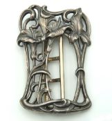 A French silver buckle of art nouveau form, stampe