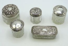Five antique silver topped dressing table tidies i